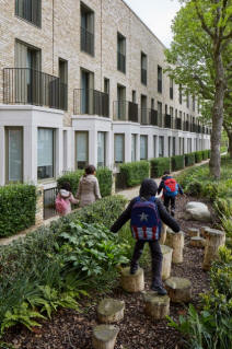 a picure of a family enjoying a natural space within an urban environment 